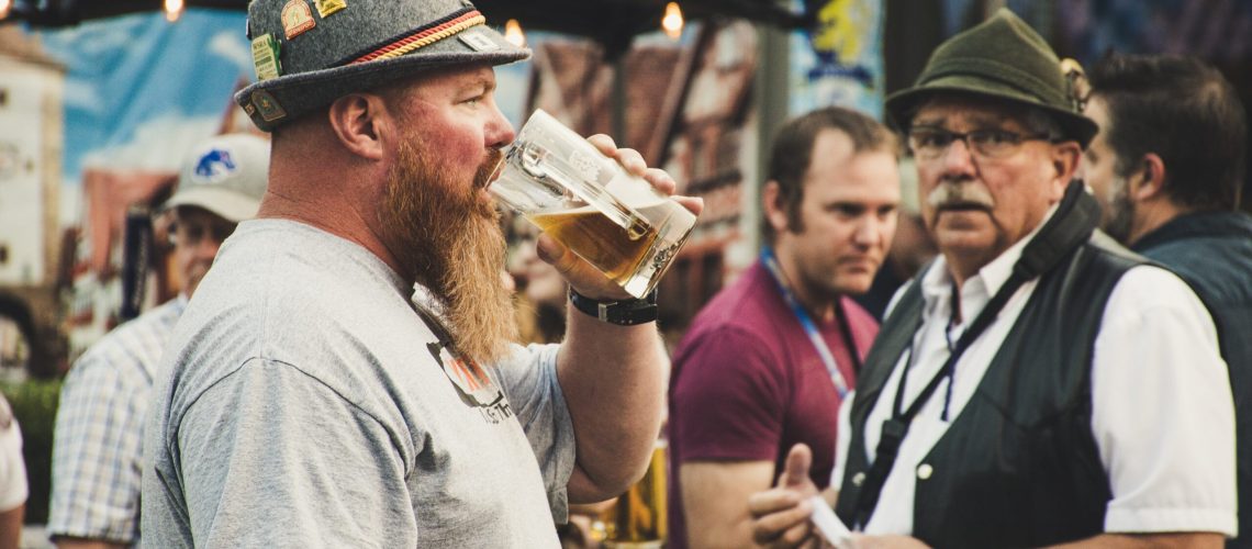 octoberfest man enjoying craft beer